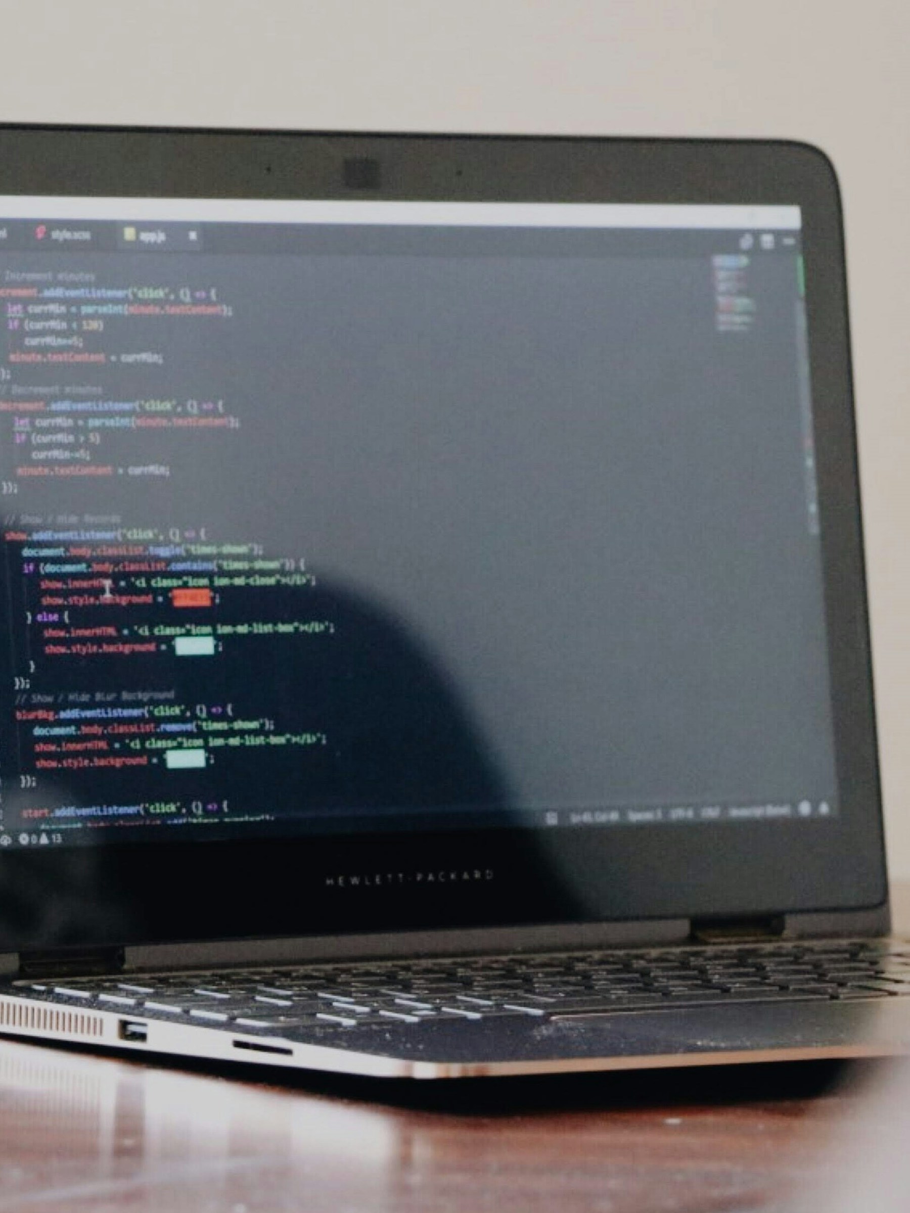 Developer writing code on a screen